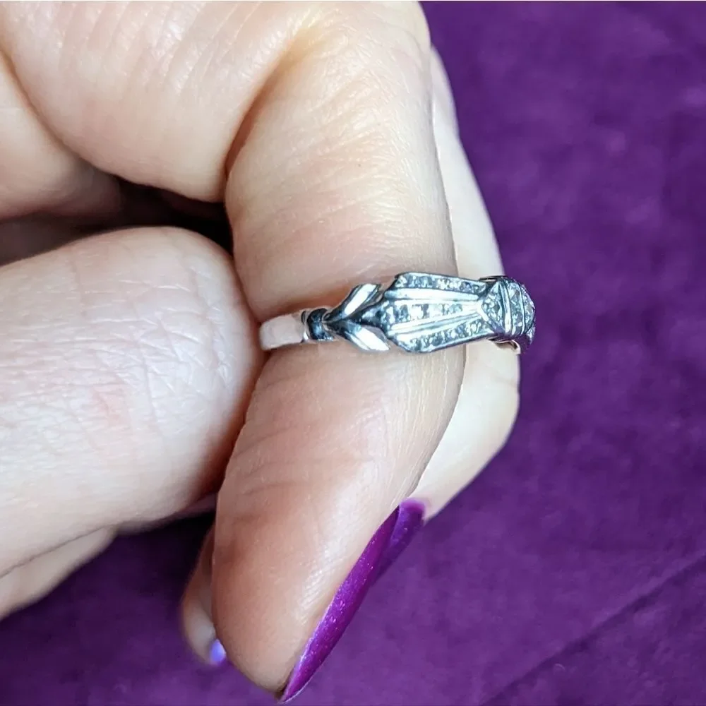 READ CAREFULLY bow shaped platinum ring